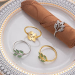 anneaux décoratifs élégants feuilles stylisées strass doré argenté vert décoration table événement