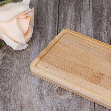 planche découper bois naturelle simple rustique plateau cuisine plante artificielle pot noir horizontal rayures