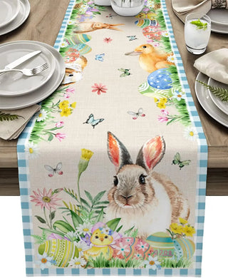 nappe table printemps pâques motifs floraux lapins œufs poussins bordure carreaux beige blanc