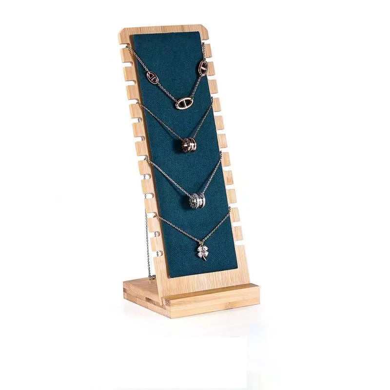 présentoir bois colliers pendentifs chaînes organisation bijoux moderne différents motifs argenté doré