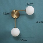 lampes murales modernes globes translucides or blanc bleu jaune gris marron minimaliste fixées mur