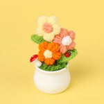 bouquet artificiel fleurs feuilles couleurs variées blanc rouge orange violet vert intérieur décoration festive