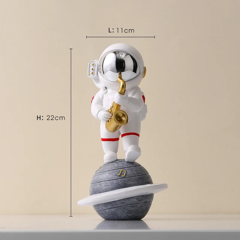 statue astronaute résine saxophone doré guitare violoncelle moderne décoration intérieure chambre salon