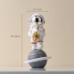 statue astronaute résine saxophone doré guitare violoncelle moderne décoration intérieure chambre salon