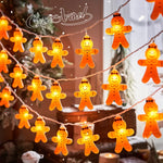 guirlande lumineuse noël père noël souriant orange noeuds papillons led festif