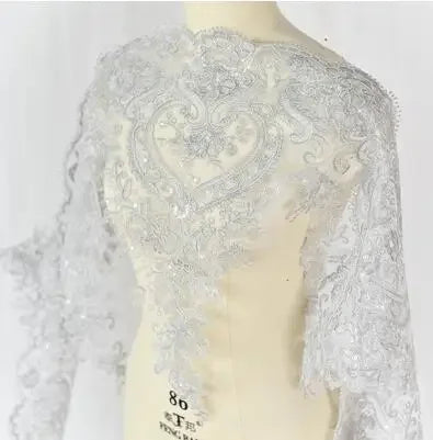 étole élégante broderie fine motifs floraux géométriques polyester translucide rose pâle bleu clair vert