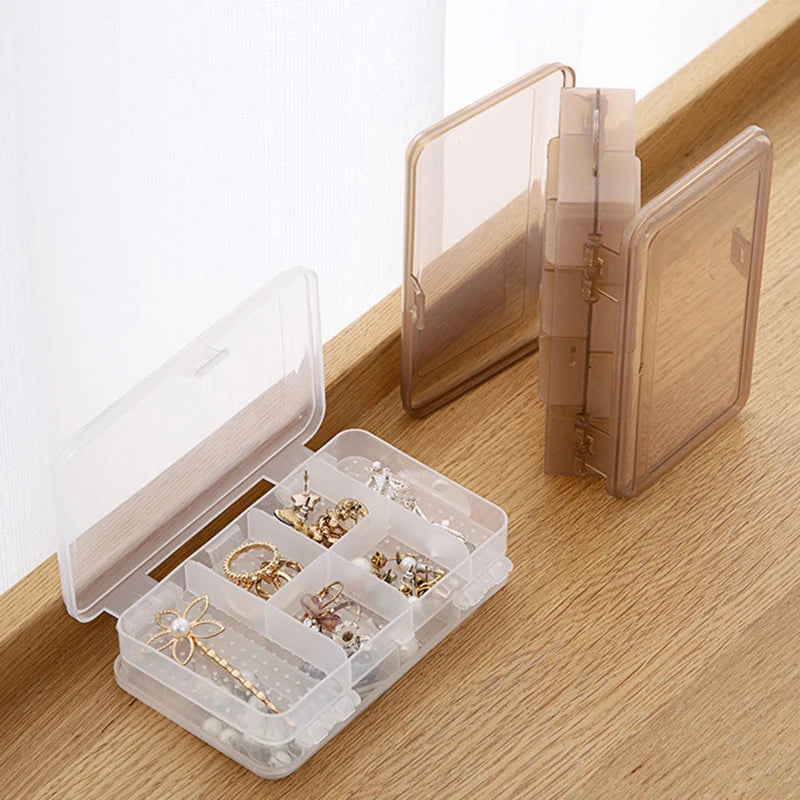 boîte bijoux transparente perforée moderne pratique clips boucles doreilles bagues bracelets organisation cheveux colliers