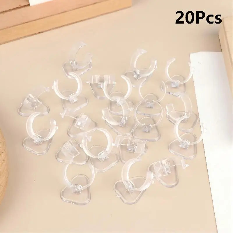 supports bijoux transparents blancs noirs clips modernes minimalistes rangement affichage bagues stockage