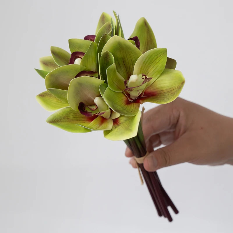 bouquet orchidées artificielles vert rouge orange rose jaune décoration mariage intérieur moderne minimaliste