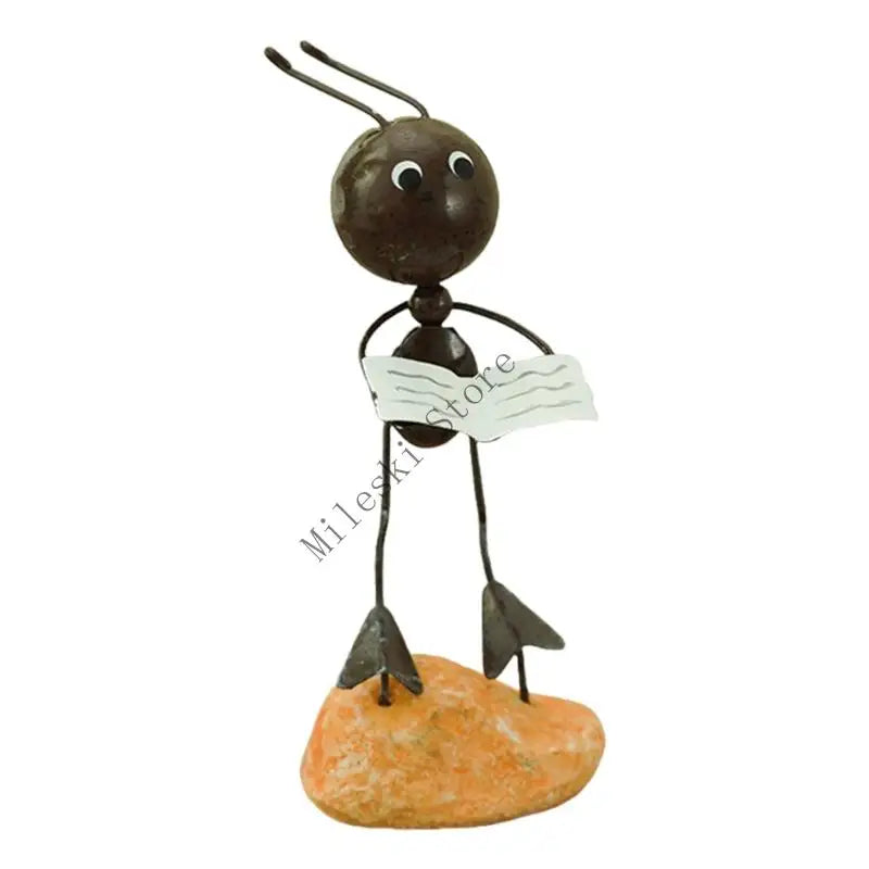 figurine métallique jardin feuilles fleurs décor extérieur moderne artisanal noir bleu vert orange blanc