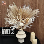 bouquets séchés naturels feuilles fines fleurs blanches plumes beige rustique décoration maison anniversaire baby