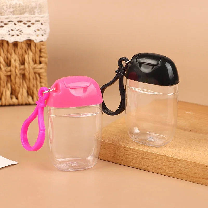 flacons rechargeables transparents modernes couleurs rouge rose bleu vert blanc jaune anneaux fixation couvercles