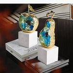 sculpture moderne or fruit marbre transparent poire pomme décoration intérieure contemporain