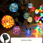 guirlande lumineuse solaire led multicolore sphères métalliques ajourées décoration extérieure festive bohème pic sol