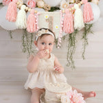 couronne bannière anniversaire fille rose fleurs pompons chiffre décoration fête enfant boho