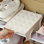 organisateur chaussures étagère rangement minimaliste cintre fer alvéoles circulaires relief blanc beige