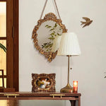 miroir baroque doré ornements sculptés anges chaines decoration maison accessories français