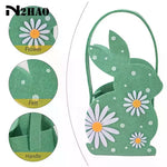 sac main forme lapin fleurs blanches taches noires couleurs vert rose bleu jaune pâques