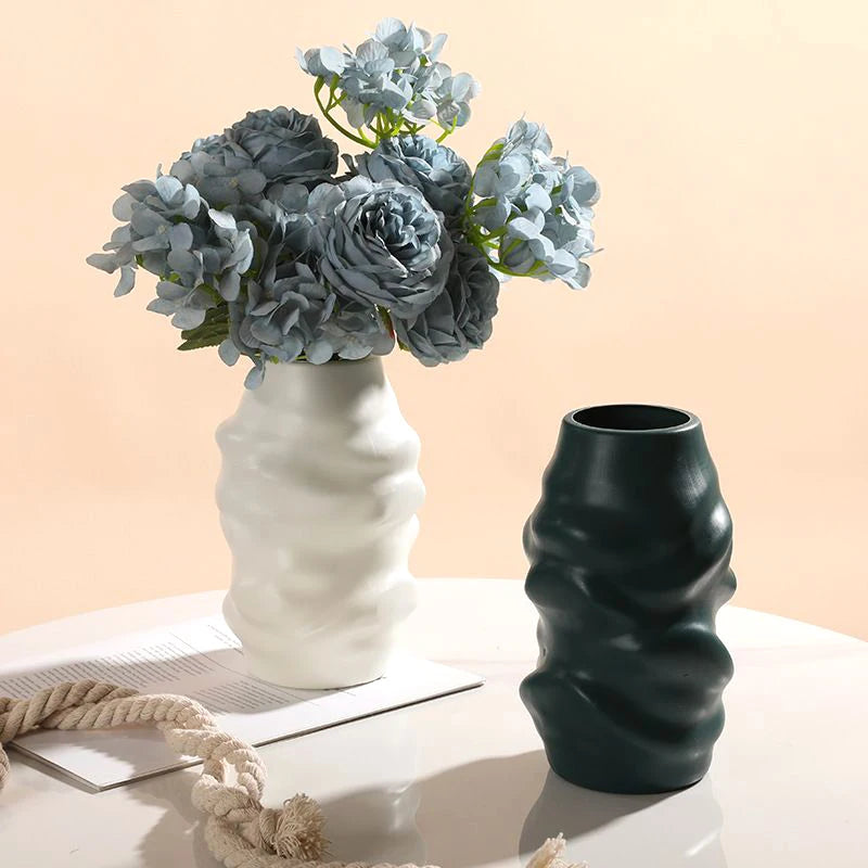 vases modernes orange blanc vert rayures horizontales opaques décoration intérieure papier bougie fleurs artificielles