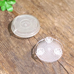 dispositif florale plastique noir transparent picots tiges verticales decoration utilitaire minimaliste
