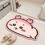 tapis sol salle bain antidérapant absorbant diatomée chats yeux roses moustaches noires bleu clair