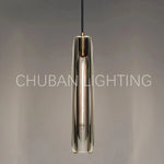 luminaire suspendu moderne verre transparent or métal cuivre chambre étude minimaliste