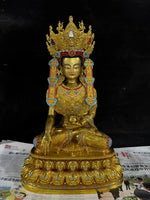 statue bouddhiste or turquoise rouge blanche motif complexe texture lisse traditionnel lotus assis grande