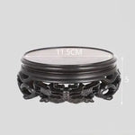 support bois sculpté motifs floraux artisanal decor maison marron foncé tranchant deco vase pot