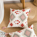 housse coussin carré boho chic motifs géométriques pompons couleur neutres décor maison