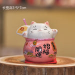 chat souriant tirelire céramique japonaise motifs floraux couleur rouge vert rose bleu jaune