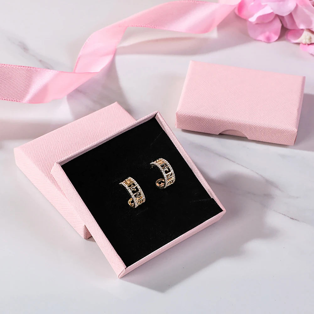 boîtes bijoux rose rayées rangement colliers boucles oreilles bracelets diamants nouveau anoël valentin