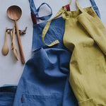 tablier coton bleu marine noir poche ajustement nœuds élégants résistance taches cuisine classique fonctionnel