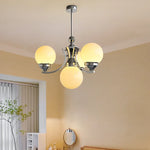 lustre moderne chrome sphères translucides suspension câble led têtes têtes orange