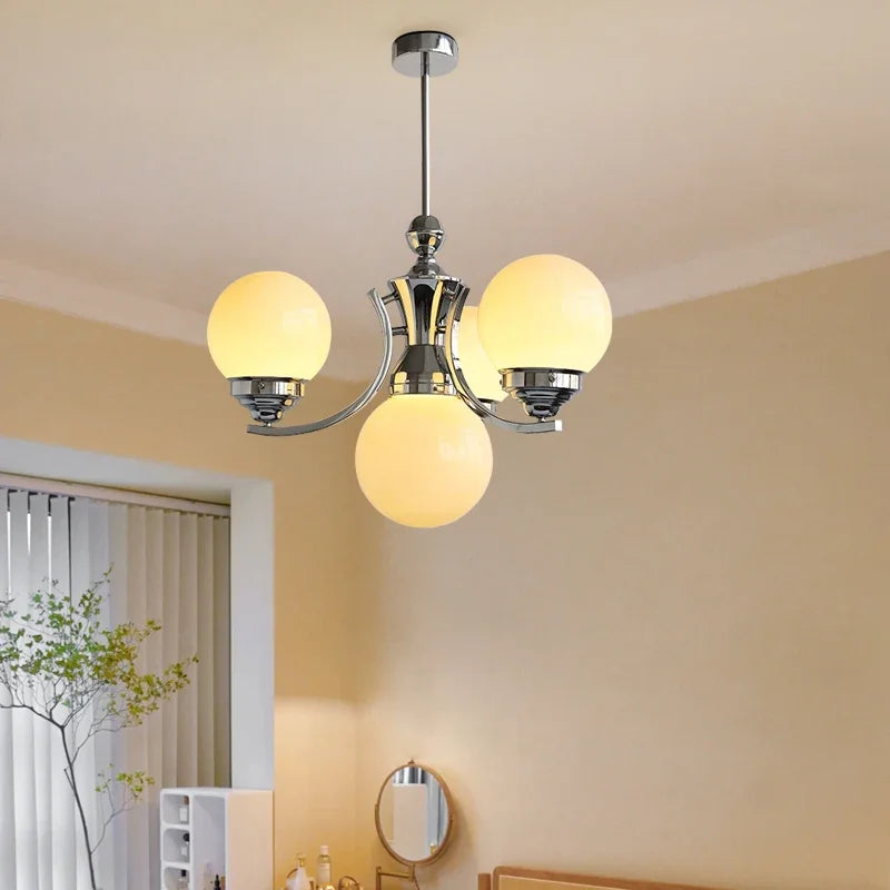 lustre moderne chrome sphères translucides suspension câble led têtes têtes orange