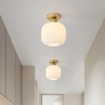plafonnier moderne minimaliste doré blanc striations verticales opaque lumiere led chambre salon