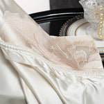 ensemble literie luxueux blanc cassé broderie florale satinée pièces king queen
