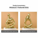 figurine deco moderne or noir blanc personne assise livre socle chambre abstraction minimalisme
