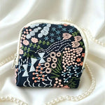 sac rangement bijoux fleurs papillons motifs floraux zips beige doré bleu rose verte Jaune