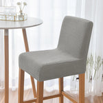 housse chaise haute tissu géométrique moderne gris noir beige marron clairversible élastique occasionnelle restaurant