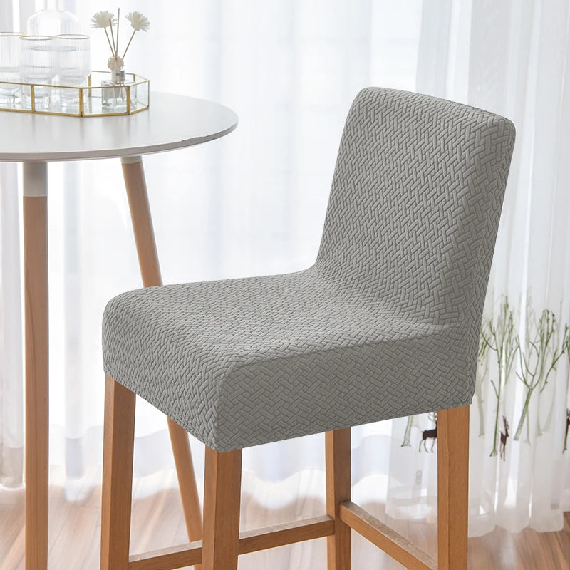 housse chaise haute tissu géométrique moderne gris noir beige marron clairversible élastique occasionnelle restaurant