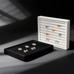 boîte bijoux cuir noir blanc plateau rangement bague boucle d'oreille organisation modernescrição