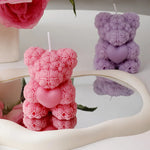 bougies parfumées forme nounours parfum rose couleur violet rouge blanc aromathérapie
