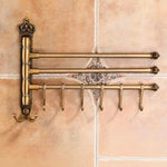 porte serviettes pivotant bronze antique ornements dorés classique vintage mural serviettes fixations visibles