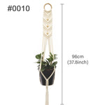 support plante suspendu macramé boho artisanal blanc beige orange tissé oeilletsextérieur exposition arbres