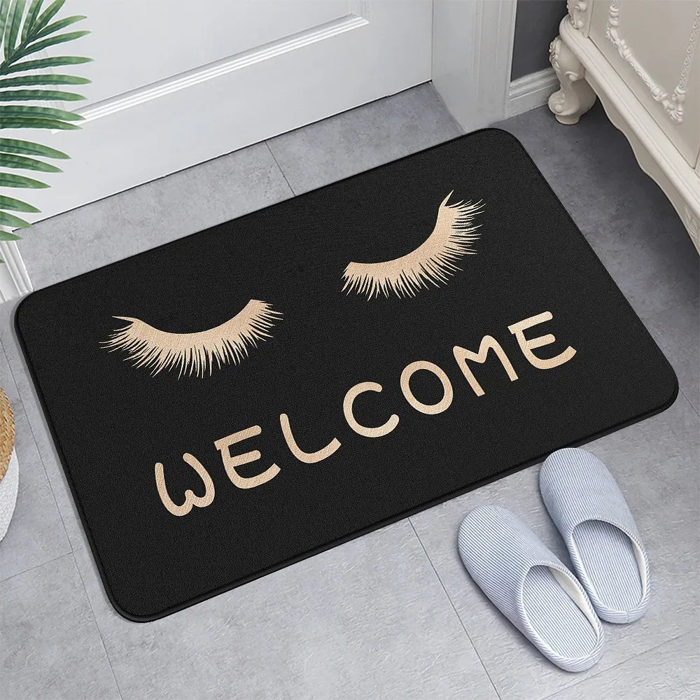 tapis d'entrée moderne yeux poupée welcome chiens os noir roseclair blanc
