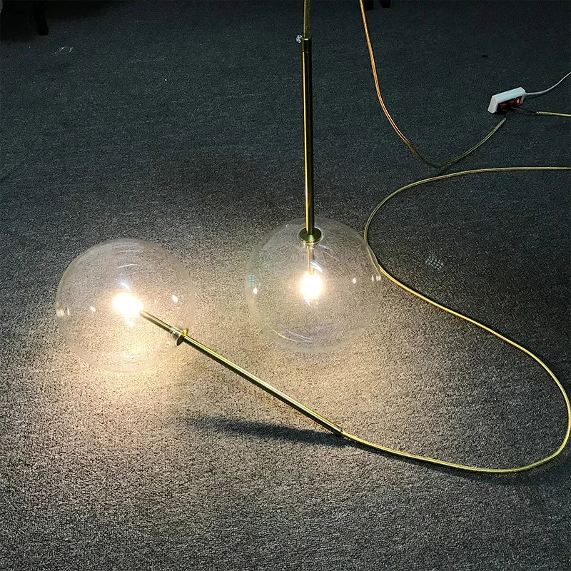 suspension lumineuse moderne transparente dorée brillante scandinave câble électrique fixée