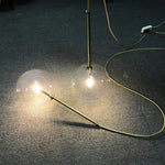 suspension lumineuse moderne transparente dorée brillante scandinave câble électrique fixée