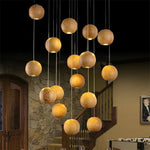 luminaire suspension bois massif moderne éclairage intérieur salon cuisine restaurant naturel