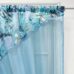 Détail motif feuilles rideau tulle bleu