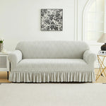 housse canapé gris clair jacquard motif feuilles stylisées élastique protection banc